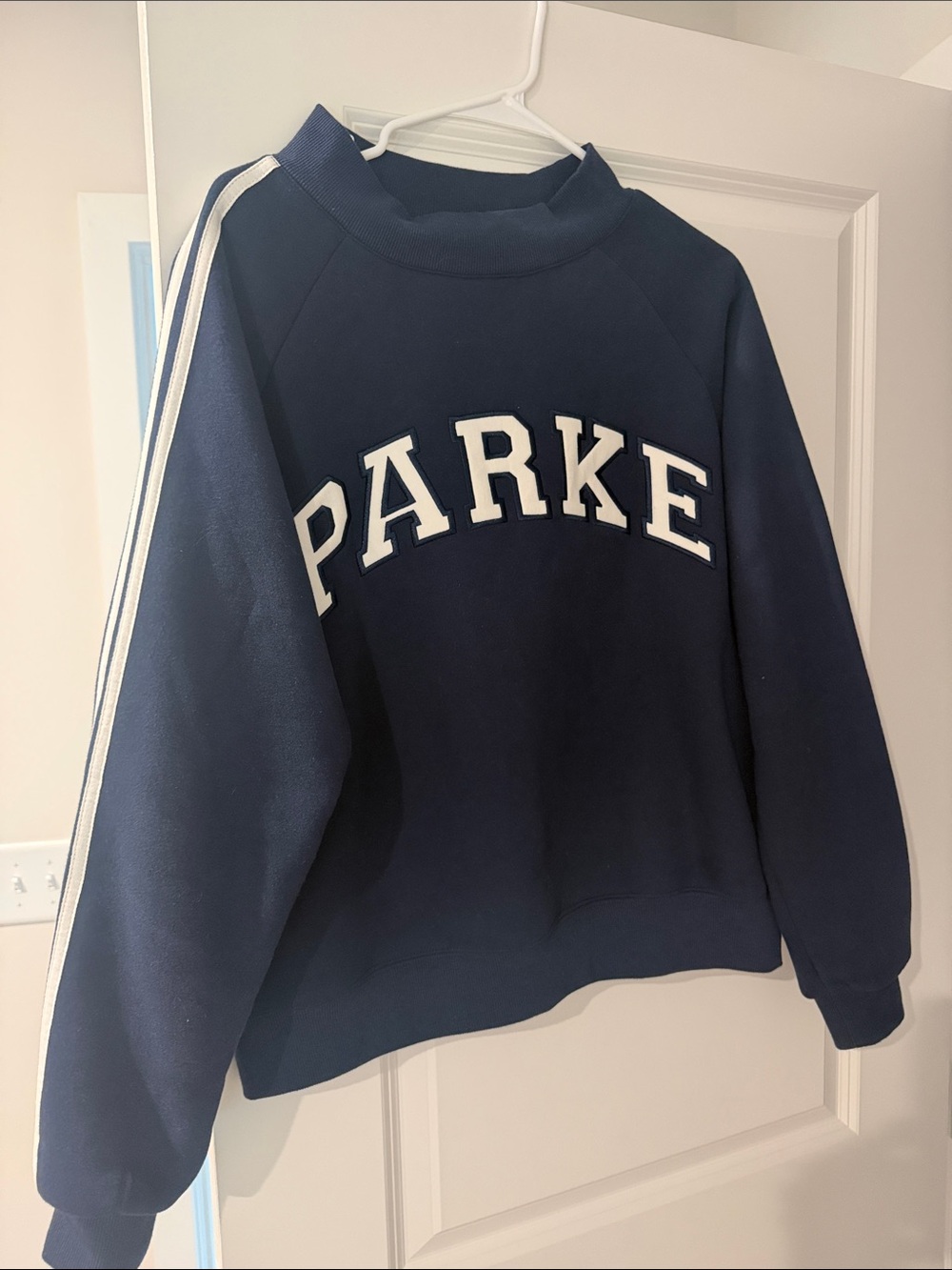 Parke Navy Crewneck Sweatshirt with White Lettering and stripes down the sleeve